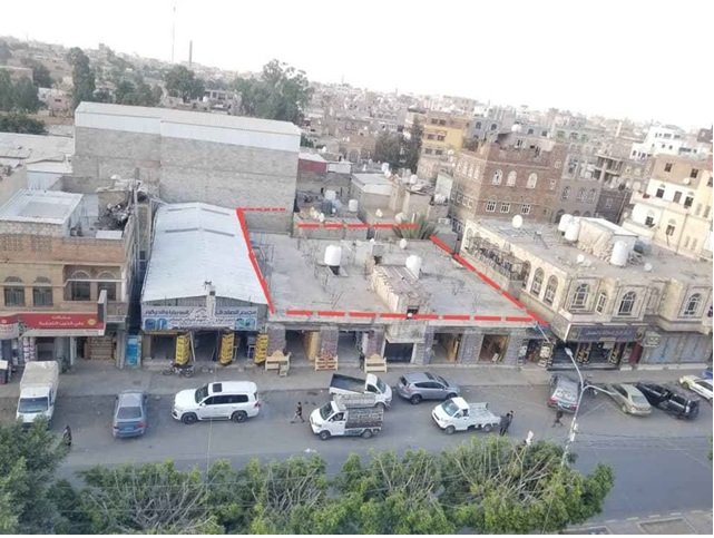 ارض ومبنى تجارية